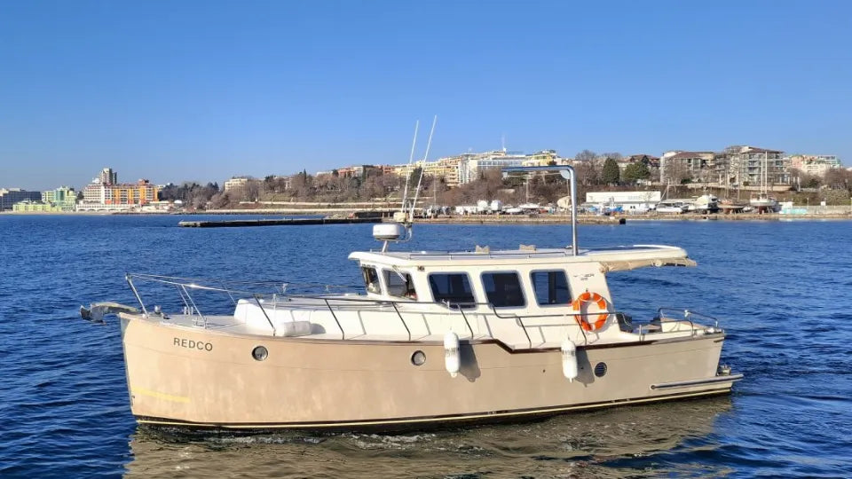 Departing from Nessebar Old Town marina at sunset