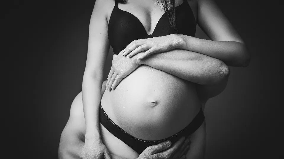 Soft silhouette of a pregnant woman in a studio, Sofia