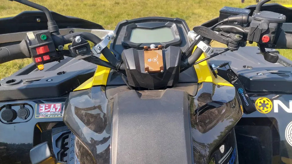 Two‑seat ATV on an off‑road route above Belmeken with Rila views