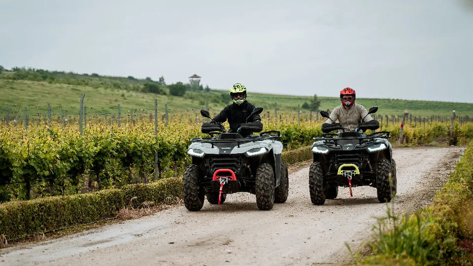 Two people sharing one ATV on a tour near Plovdiv