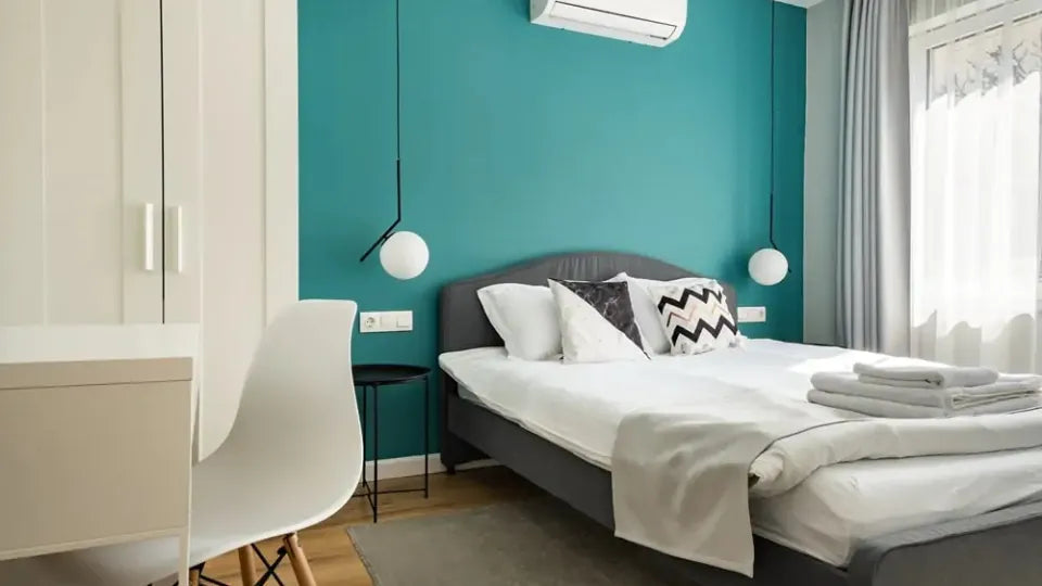 55‑inch TV and soft seating in the living area – Velingrad family apartment