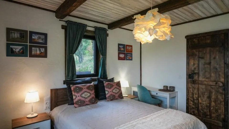 Garden area with stone fountain at Iris Apartment, Rhodope Mountains