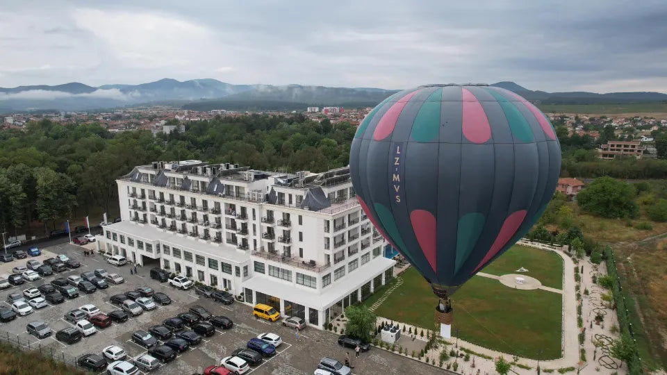 Tethered hot air balloon ascent in Pavel Banya with views of the Balkan Mountains and the Rose Valley
