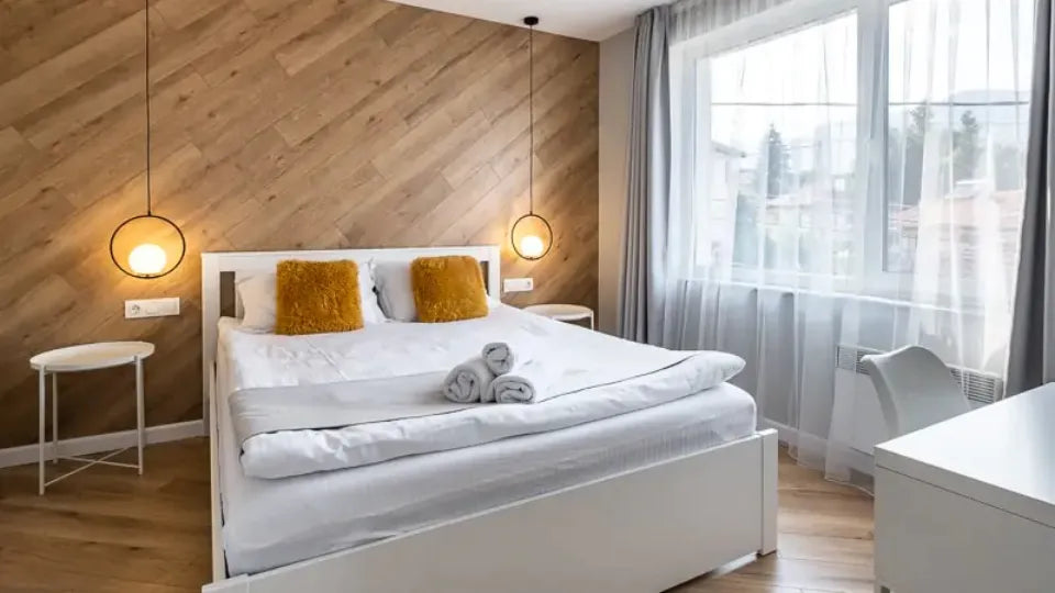 55‑inch TV and cosy interior in a Velingrad apartment