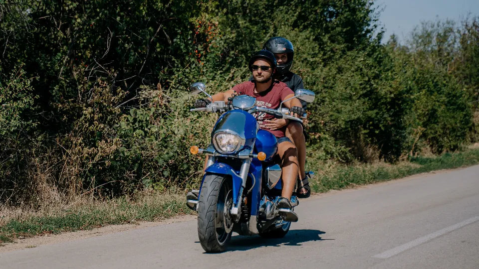 Suzuki M109R cruiser with passenger overlooking Veliko Tarnovo