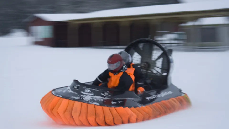 Participant on hovercraft with helmet and life jacket, Sofia