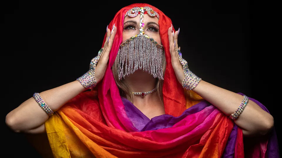 Woman practicing belly dance at home during an online course