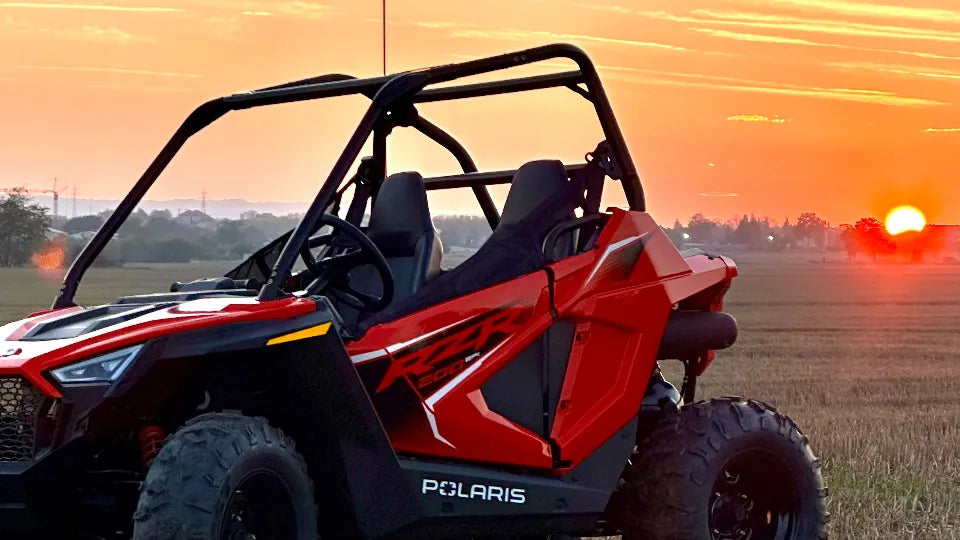 Child driving a UTV on an off-road route in Golden Sands, Varna
