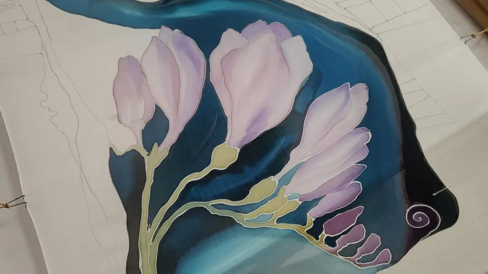Finished hand‑painted silk scarf from the workshop
