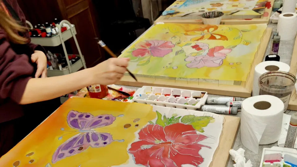 Complimentary drink during the silk painting session