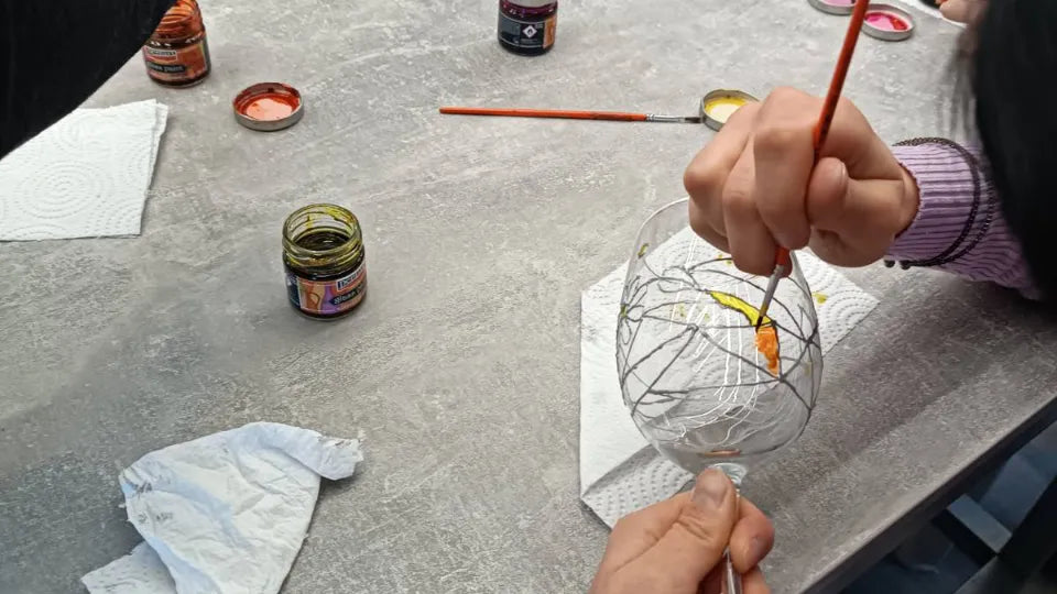 Completed hand‑painted wine glasses from the workshop, Veliko Tarnovo