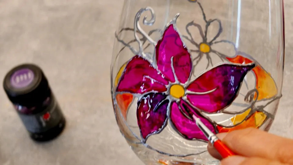 Professional glass paints and tools set out in the studio, Veliko Tarnovo