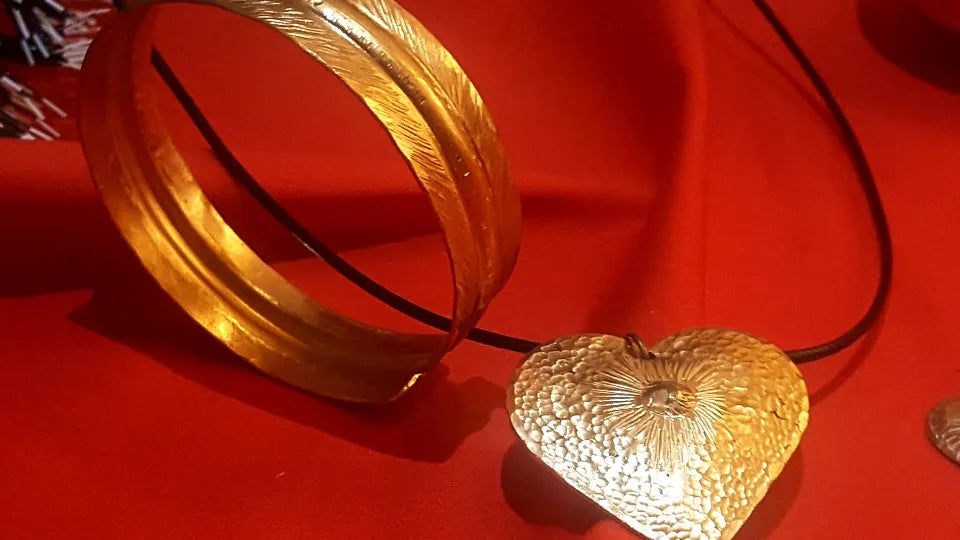 Making copper earrings in a group coppersmithing class