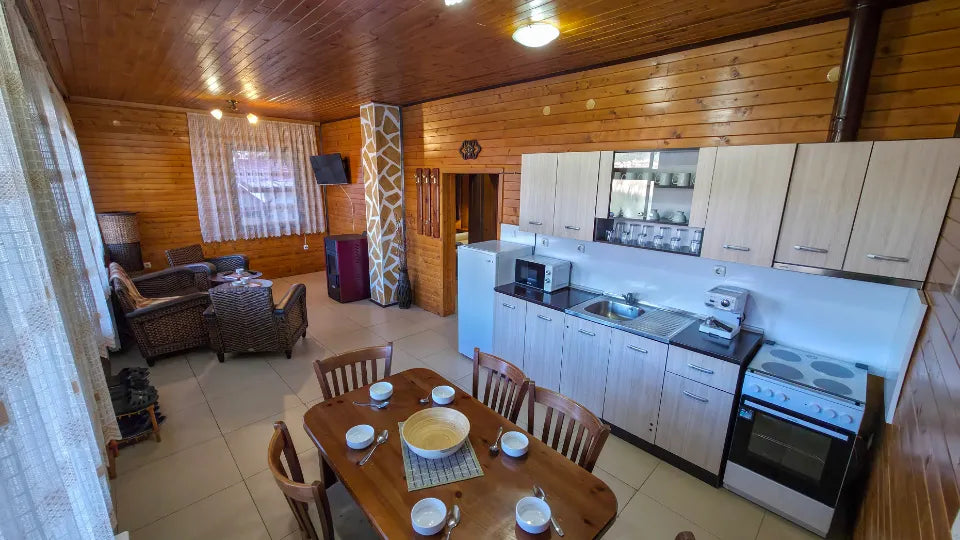 Veranda with panorama of Dospat Reservoir at Iva Holiday Village