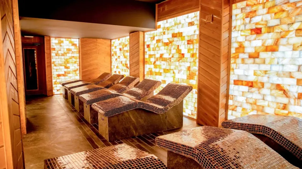 Outdoor mineral pools with mountain backdrop – Banya