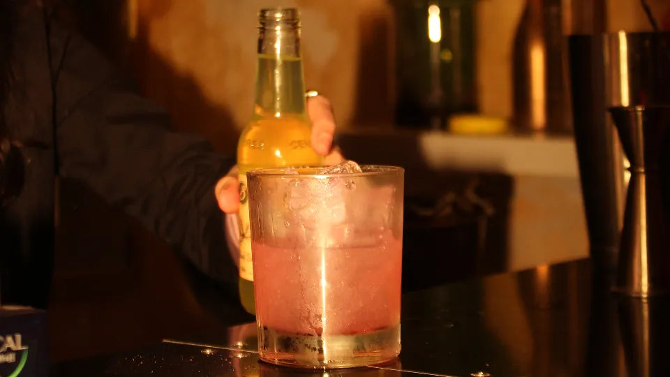 Garnishing and serving drinks at a cocktail course in Burgas