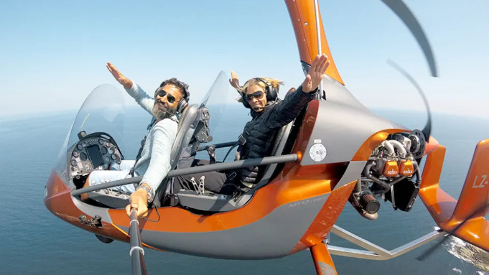 Open-cockpit gyrocopter over the Southern Black Sea coast